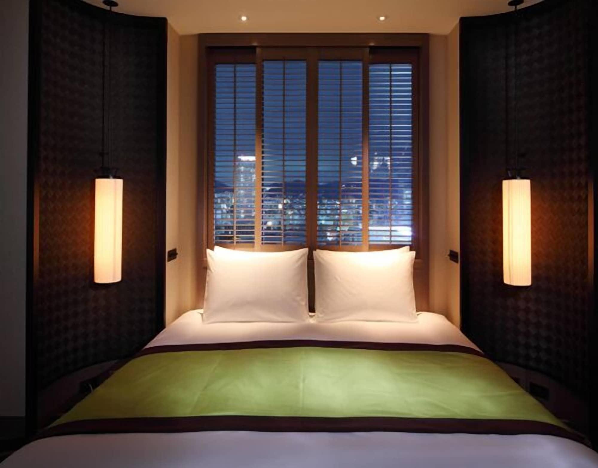 Oriental Hotel Кобе Екстериор снимка A bedroom at the hotel